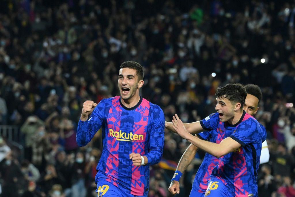 Relief: Barcelona's Ferran Torres celebrates after scoring