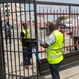 Operatives of the Lagos Safety Commission and the Rapid Response Squad sealing off the event centre. [Twitter:Cable]
