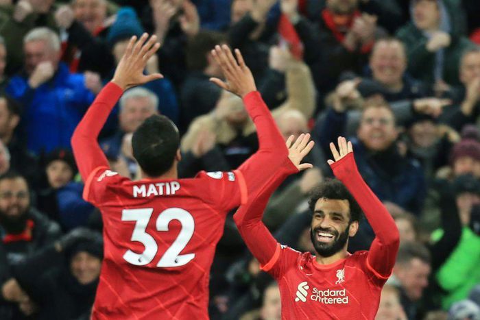 Liverpool's Joel Matip (L) celebrates with Mohamed Salah