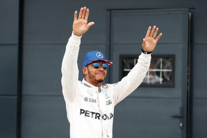 Britain Formula One - F1 - British Grand Prix 2016 - Silverstone, England - 9/7/16 Mercedes' Lewis Hamilton celebrates qualifying in pole position