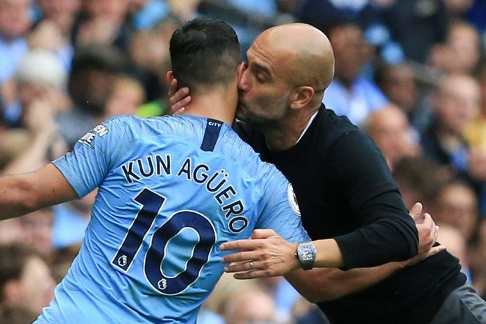 Manchester City manager Pep Guardiola kisses Sergio Aguero after he scored a hat-trick in 2018