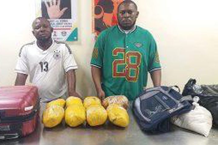 The two suspects arrested in connection to the seized drugs at Lagos airport. [NAN]