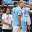 Erling Haaland and Manchester City coach Pep Guardiola