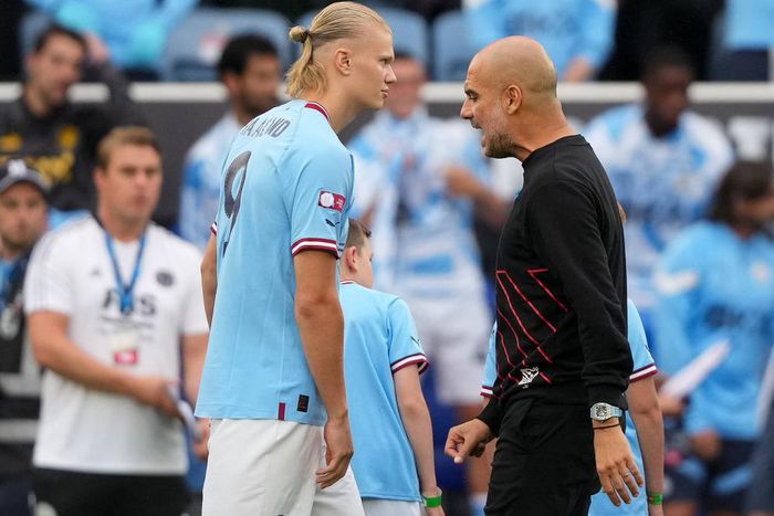 Erling Haaland and Manchester City coach Pep Guardiola