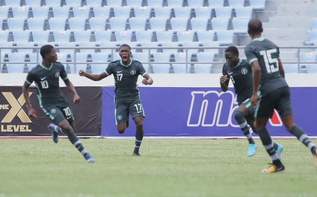 Golden Eaglets Emmanuel Michael thanks Moses Simon after scoring free kick against Ghana