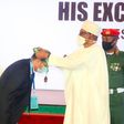 President Muhammadu Buhari presenting the 2022 National Productivity Award to Crown Flour Mill (CFM) Limited, represented by the Managing Director, Mr. Ashish Pande, during the 2022 National Productivity Order of Merit Award Ceremony held at the State ...