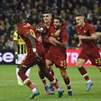Oliviera celebrates with his Roma teammates.