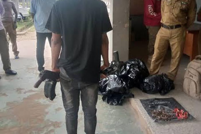 Man arrested with body bags