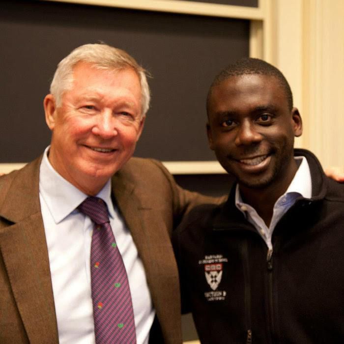 Folowosele pictured alongside legendary Manchester United mangers Sir Alex Ferguson