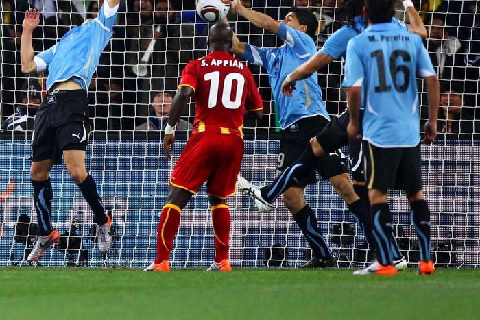 Luis Suarez stops Ghana from scoring at the 2010 FIFA World Cup.