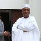 Dino Melaye (left) and the Senate President Bukola Saraki