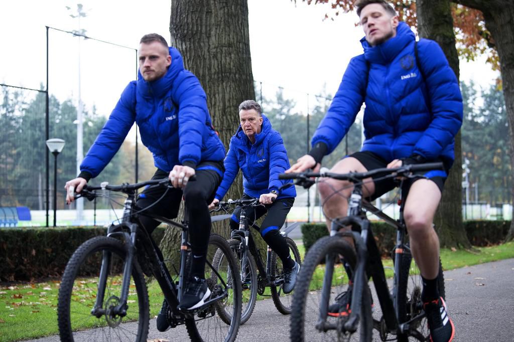 Van Gaal on a bike ride with Burnley striker Wout Weghorst and Mark Flek