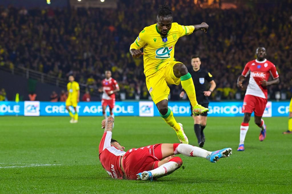 Moses Simon easily gets the better of Monaco goalscorer Guillermo Maripan