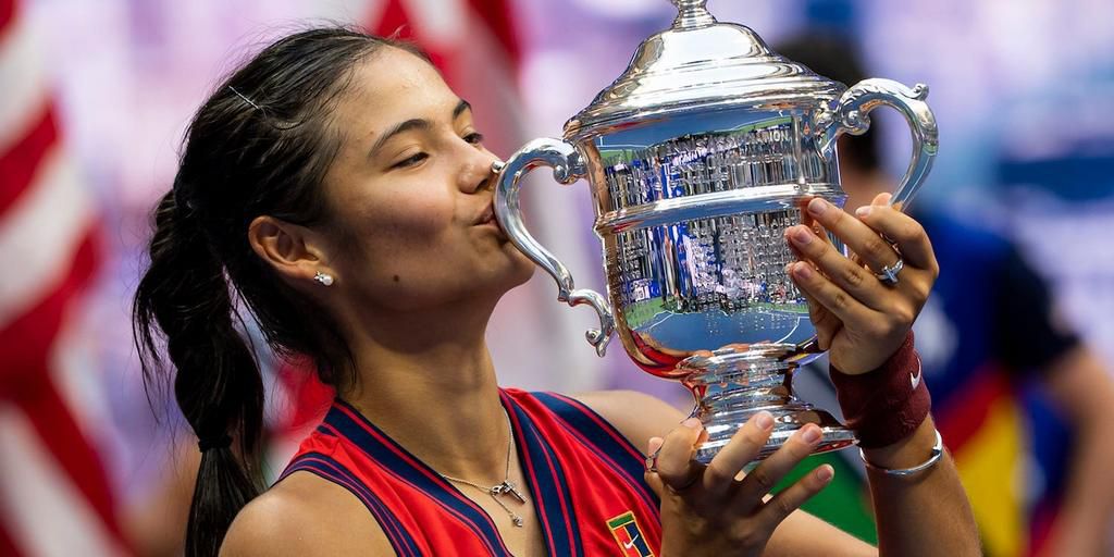 Emma Raducanu of Britain with the US Open winner's trophy after her victory over Leylah Fernandez of Canada in the final of the women's singles of the US Open on Saturday.