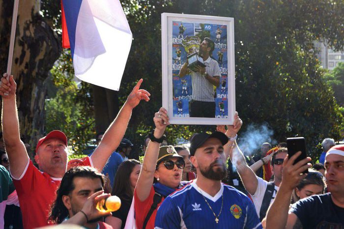 Members of the local Serbian community rally outside a government detention centre where tennis champion Novak Djokovic is staying