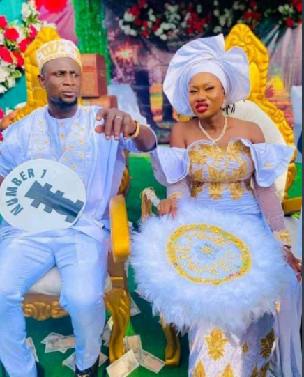 Super Eagles goalkeeper John Noble and his bride