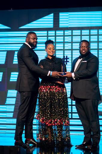 Receiving their Award for Healthech company of the year from always delectable Chizor Malize, Abere Novo CEO Reliance HMO.