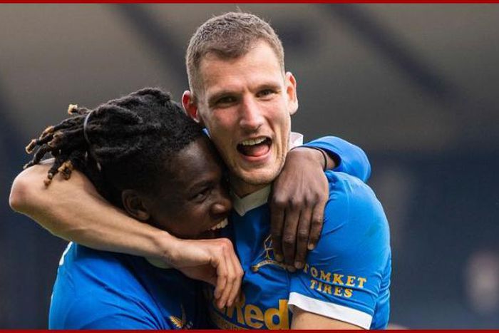 Calvin Bassey and Borna Barisic celebrate.
