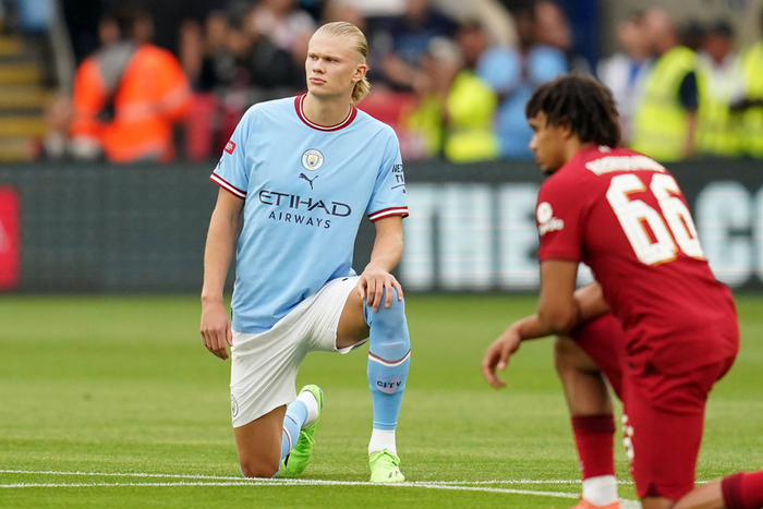 Manchester City's Erling Haaland and Liverpool's Trent Alexander-Arnold take the knee before their FA Community shield clash on Saturday July 30,2022.