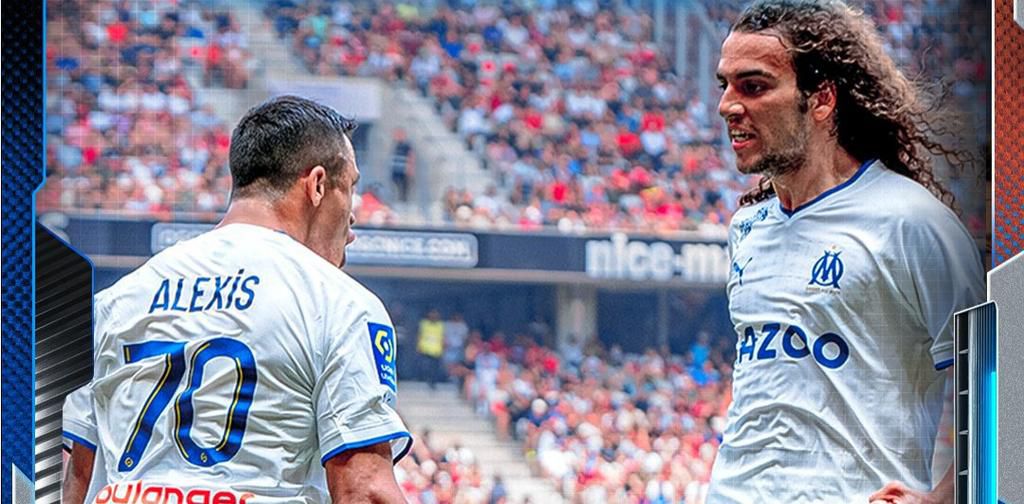 Sanchez and Guendouzi celebrate.