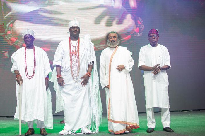 L-R: His Royal Majesty, Oba Olumuyiwa Ogunbekun, the Onilekki of Lekki Town; His Royal Majesty, Oba Adeyeye Enitan Ogunwusi (Ọjájá II), the Ooni of Ife; Gurudev Sri Sri Ravi Shankar, Global Peace Ambassador and founder, Art of Living Foundation, and fo...