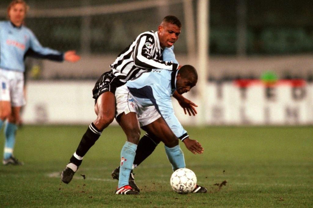 Juventus's Sunday Oliseh tries to get the ball off Celta Vigo's Claude Makelele in a UEFA Cup game