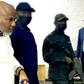 A file photo of Nnamdi Kanu (second left) at the court in Abuja. (Kola Sulaimon/AFP).