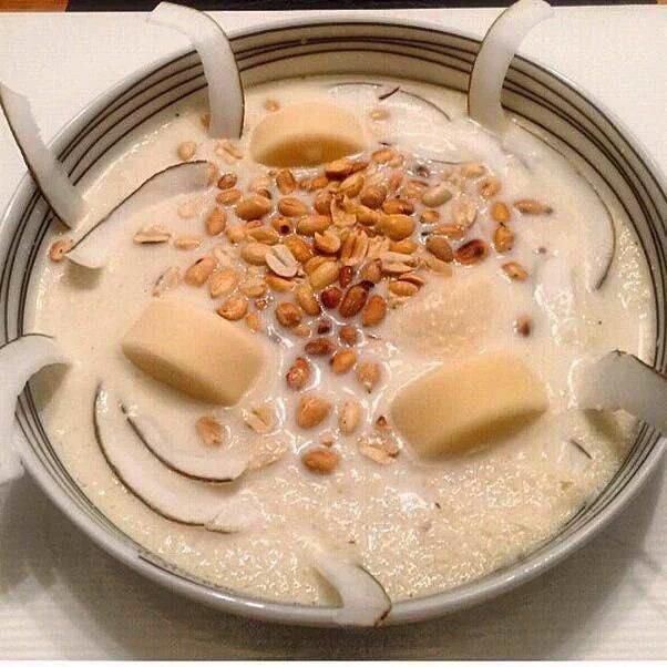 A very rich cup of  Garri goes with sugar, groundnuts, Fish and Milk