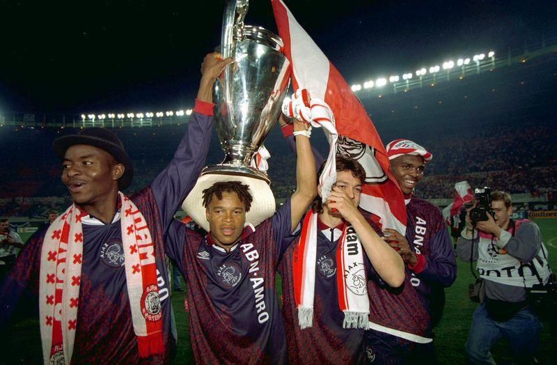 George Finidi (left) celebrating Ajax's 1995 Champions League triumph
