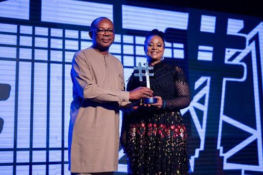 Chizor Malize presenting a recognition Award to the DG of NITDA Kashifu Inuwa