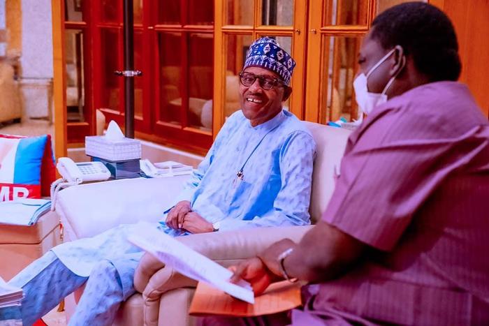President Muhammadu Buhari with media aide, Femi Adesina [Presidency]