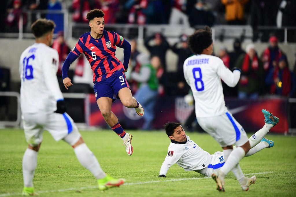 Antonee Robinson sweeps home the winning goal in the USA's 1-0 World Cup qualifying victory over El Salvador