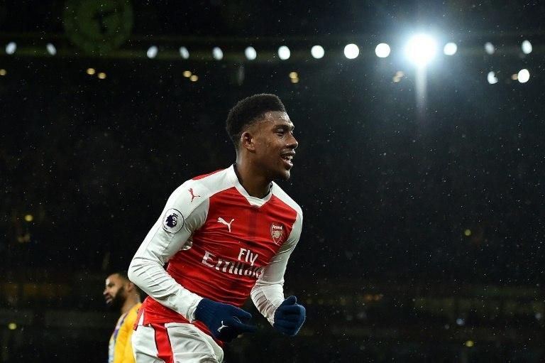 Arsenal's striker Alex Iwobi celebrates scoring his team's second goal during the English Premier League football match against Crystal Palace January 1, 2017