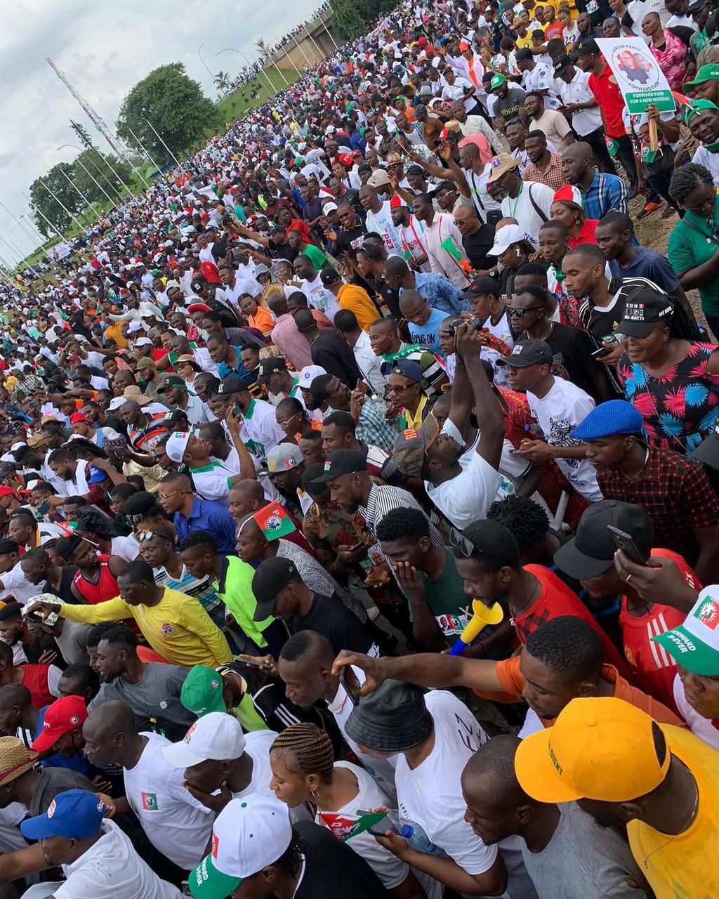 Peter Obi supporters throng Abuja streets for Obidient march .