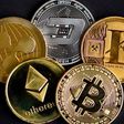 The photo shows physical imitations of cryptocurrency. INA FASSBENDER/AFP via Getty Images
