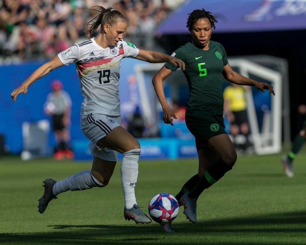 Onome Ebi defends against Klara Buehl of Germany at the 2019 Women's World Cup in Grenoble, France