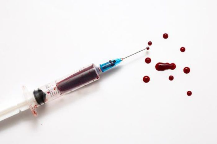 Syringe and blood