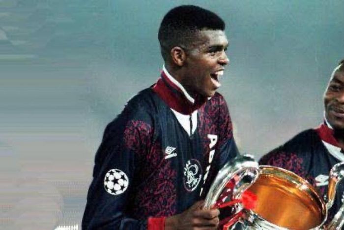 Finidi George and Kanu Nwankwo celebrate the Champions League they won at Ajax