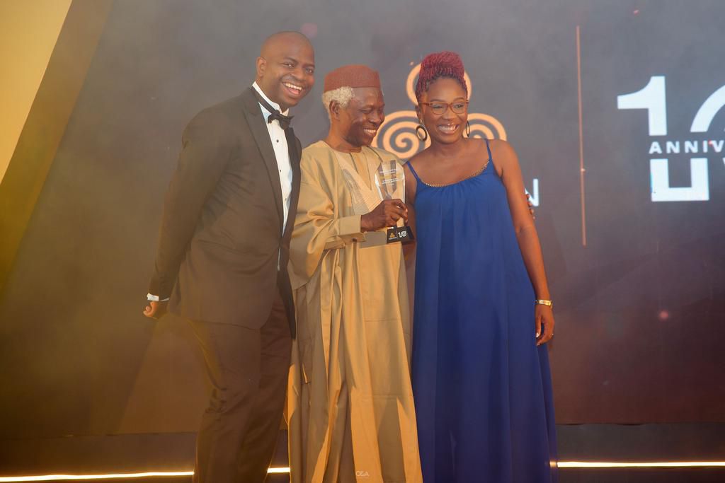 L-R: Oluseye Olusoga, Managing Director/CEO, Parthian Partners; Adedotun Sulaiman, MFR, Chairman, Parthian Partners Limited, presenting an award to Olufunmi Smith during the Gala and awards night in celebration of Parthian Partner's 10th anniversary in...