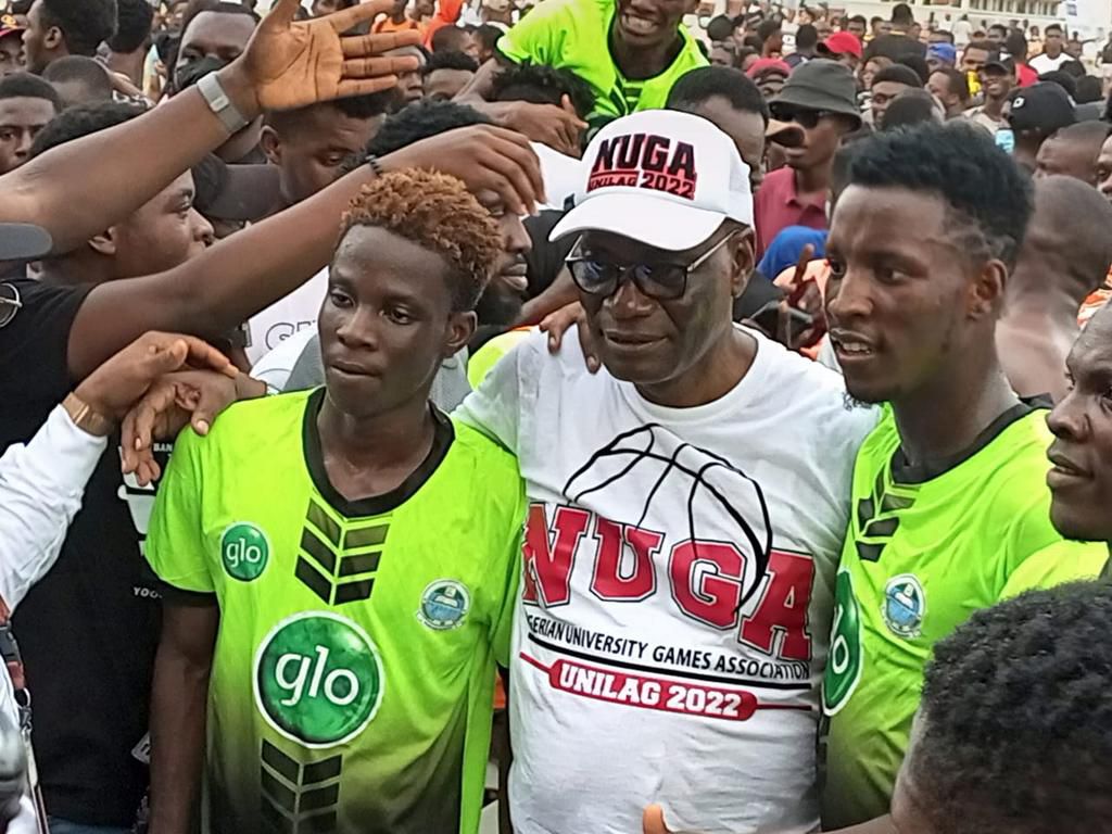 UNILAG VC celebrates with the Marines after their win.