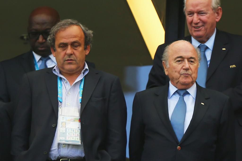 Sepp Blatter (R) and Michel Platini (L) in 2015, banned for 8 years by FIFA Ethics Committee following a corruption scandal.