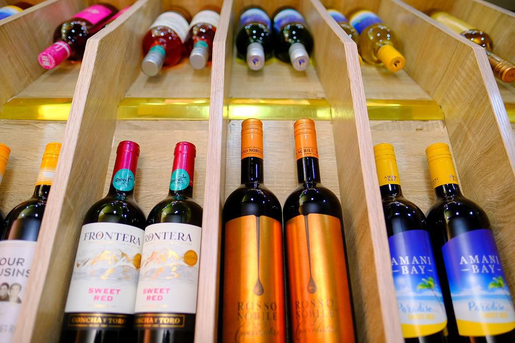 Cocktails, premium drinks, vibes and happy faces at the grand opening of the ultra premium liquor store, liquor emporium