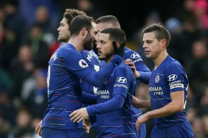 Gonzalo Higuain (left) and Eden Hazard (centre) both scored twice for Chelsea in a 5-0 thrashing of Huddersfield