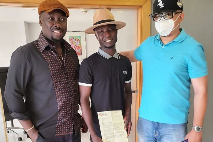 Obi Cubana presents Lagos hawker with scholarship letter, 100k monthly salary. [Instagram:Obi Cubana]