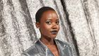 Oscar winner Lupita Nyong'o posed against the silver backdrop in a sequinned silver blazer dress.