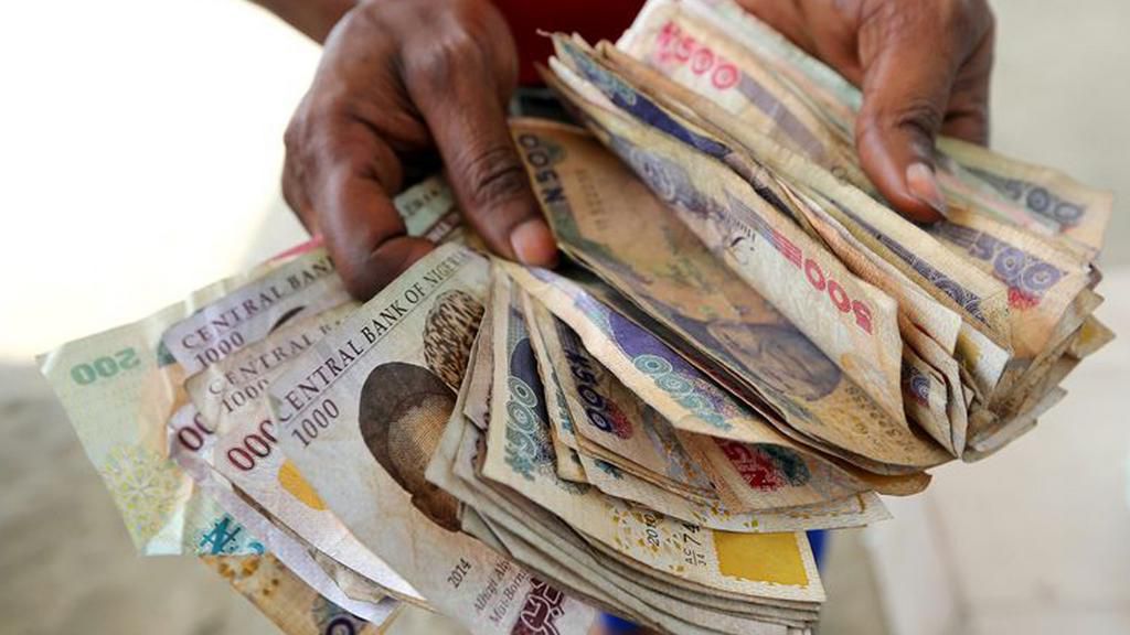 Naira notes on display [Guardian]
