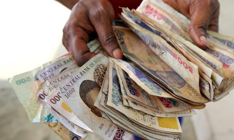 Naira notes on display [Guardian]