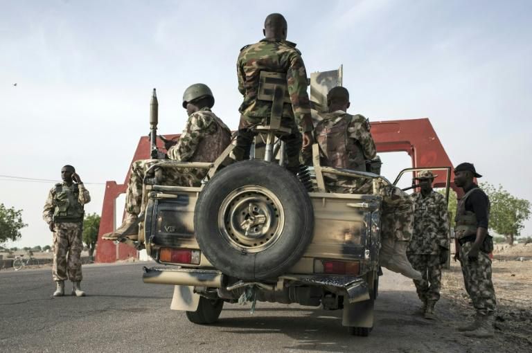 Nigerian soldiers patrol in Maiduguri in Borno State northeast Nigeria on March 25, 2016