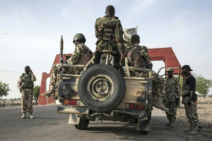 Nigerian soldiers patrol in Maiduguri in Borno State northeast Nigeria on March 25, 2016