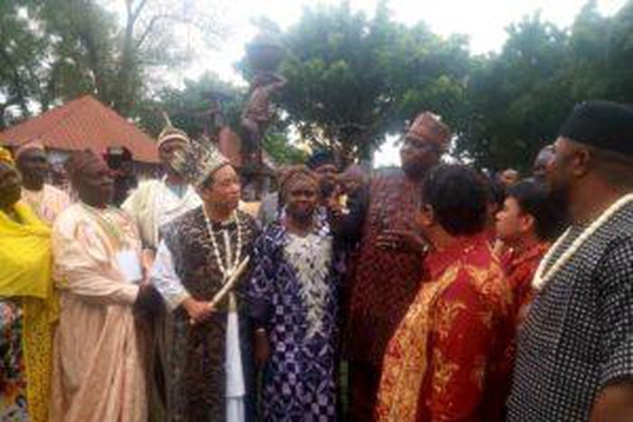 Zheng Xiapeng, Chinese national who bagged two chieftaincy titles in Nigeria with dignitaries at the 16th INAC. [NAN]